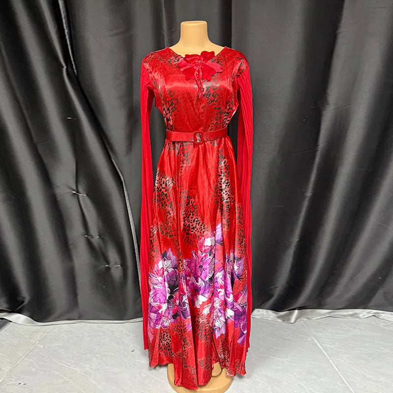 Elegant African women’s long dress featuring Ankara print, sequins, and plus size fit, suitable for weddings and parties.