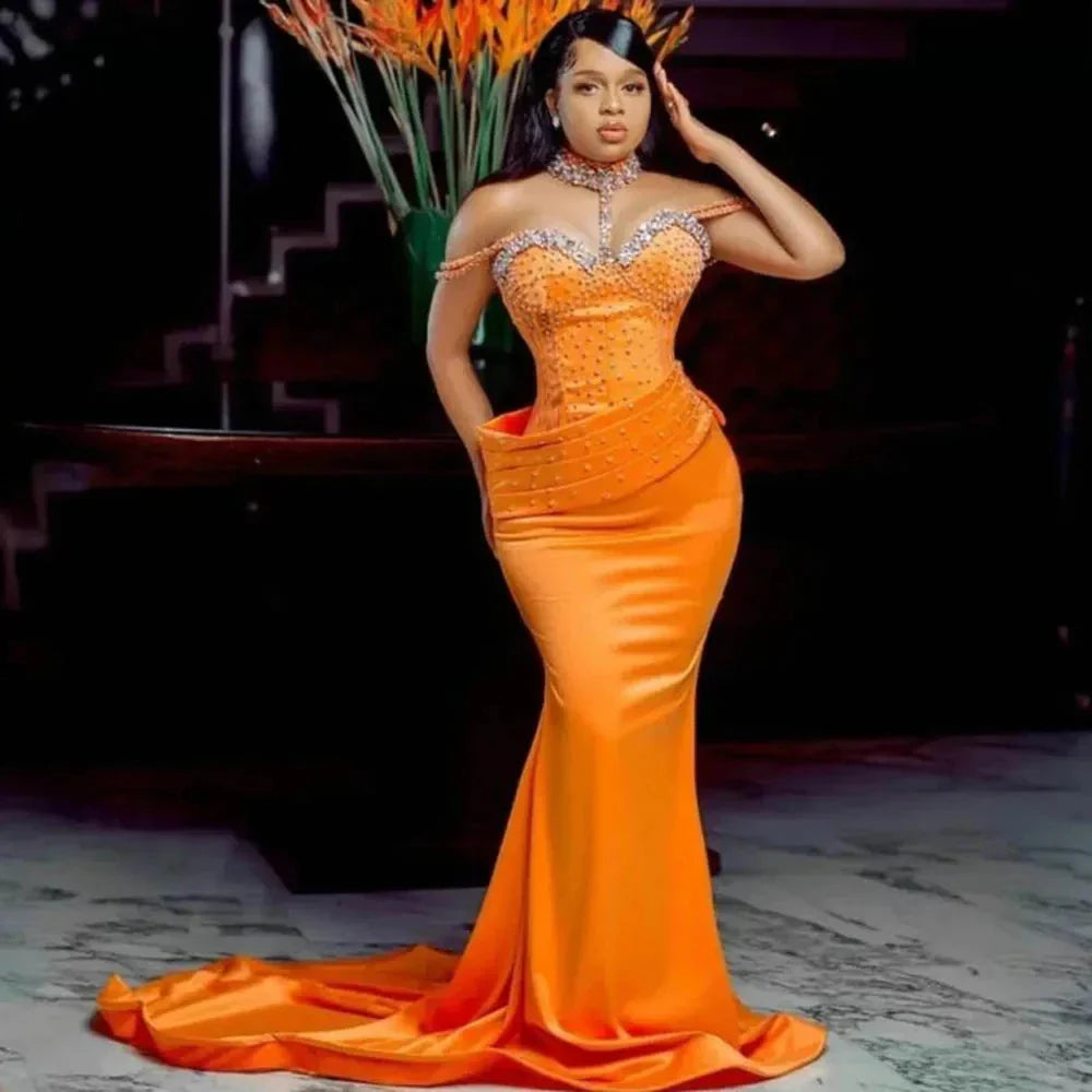 Orange mermaid prom dress by SHOWLU FASHION STORE featuring a high neck, beaded satin evening gown with a mermaid silhouette.