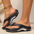 Women's thick platform EVA flip flops by JIANZONG with soft cloud foam for comfortable beach sandals.