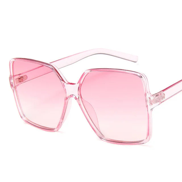 Oversized women's sunglasses with gradient plastic lenses and UV400 protection, featuring a stylish designer look by Showlu Fashion.