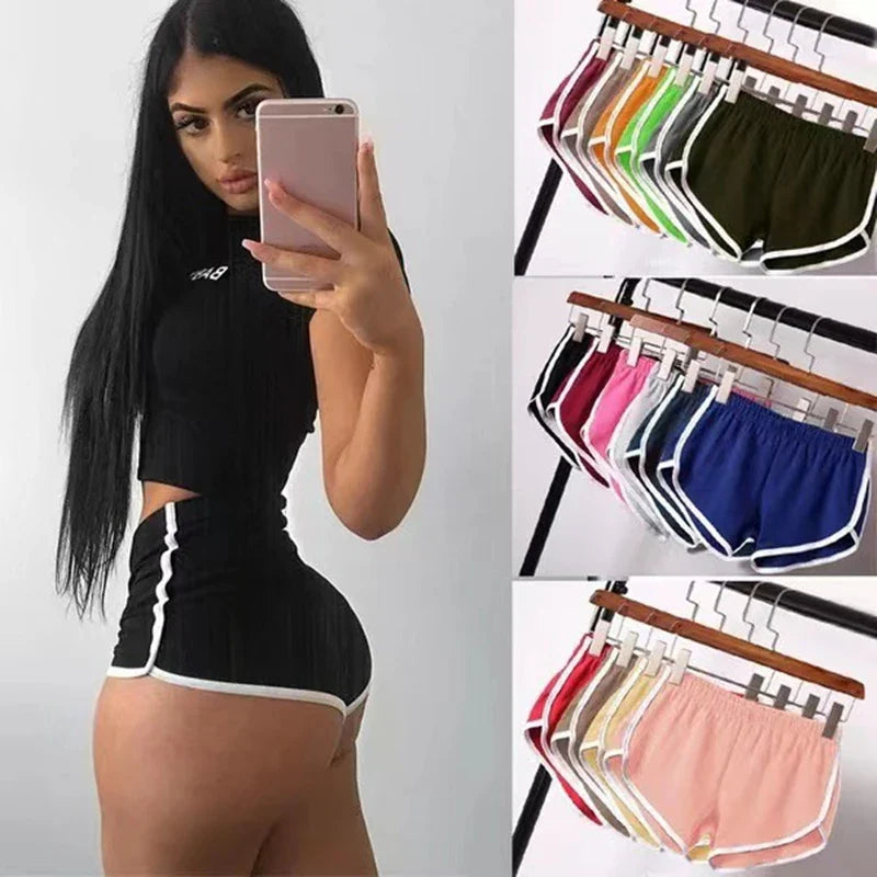 Black SHOWLU Women's high-performance yoga shorts designed for gym and running, lightweight and comfortable for active wear.