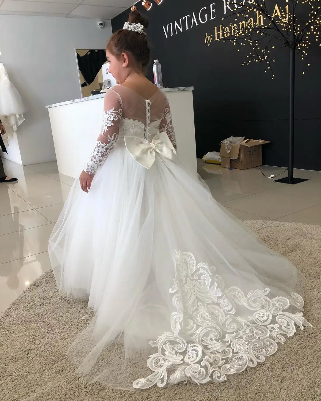 Lace flower girl dress by Showlu Fashion Store featuring floral tulle ball gown style for weddings, with delicate lace details and a full skirt.