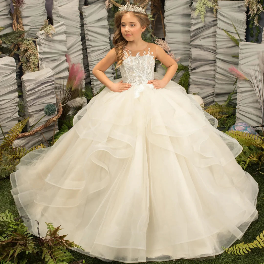 Light champagne flower girl dress by Gdybao featuring a tulle tiered ball gown style for weddings.