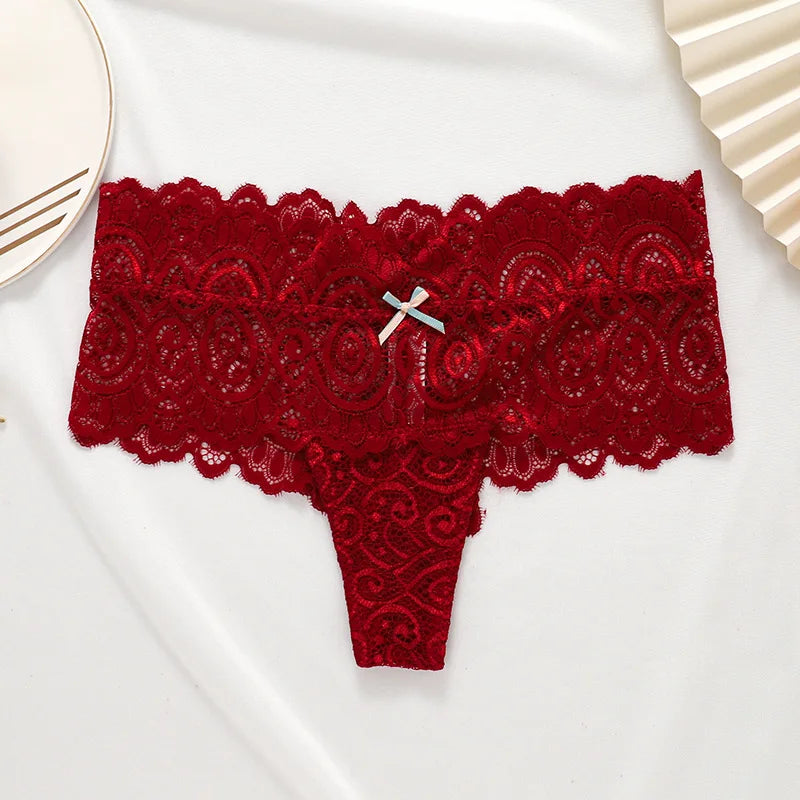 Showlu Fashion Women's lace thong lingerie, low-waist breathable G-string with intricate lace design and comfortable fit.