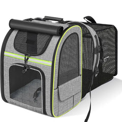 A grey expandable pet carrier backpack with breathable mesh panels and a roll-up shade cover.