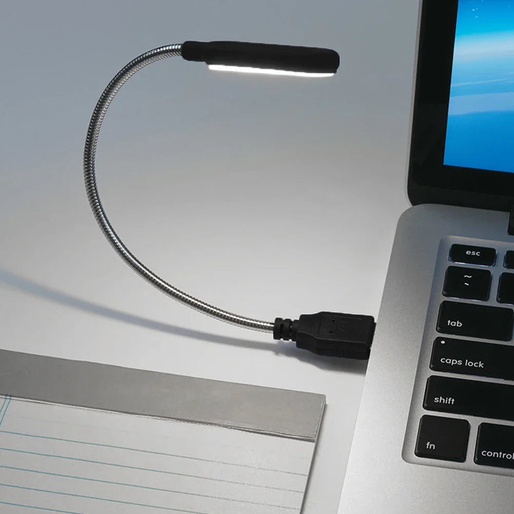 Showlu Smart General USB LED light attached to laptop with flexible arm, providing bright, energy-efficient illumination.