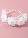 White flower girl headband with elegant floral design, perfect for wedding bridal parties and special occasions.