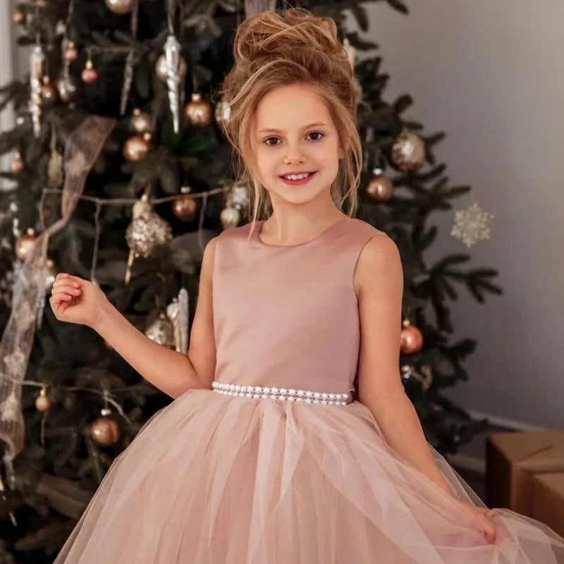 Dusty pink flower girl dress by Showlu Fashion Store with pearl belt, ball gown style, perfect for weddings.