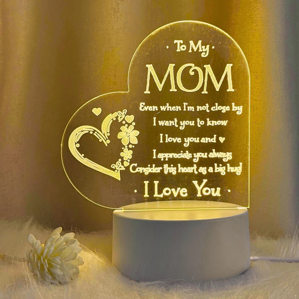 Showlu Fashion Heart Carving Night Light emitting a warm glow, ideal as a birthday gift for mom.