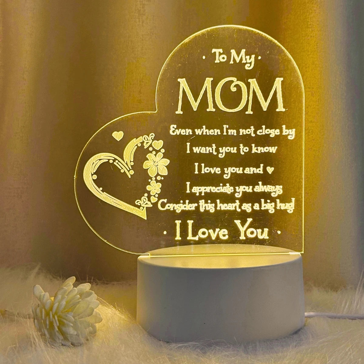 Showlu Fashion Heart Carving Night Light emitting a warm glow, ideal as a birthday gift for mom.
