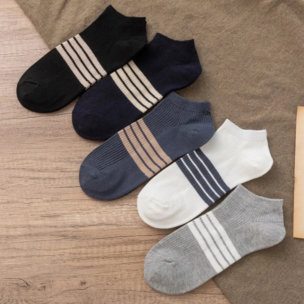 Set of men's striped cotton sports ankle socks with breathable, sweat-absorbing fabric for comfort and style.