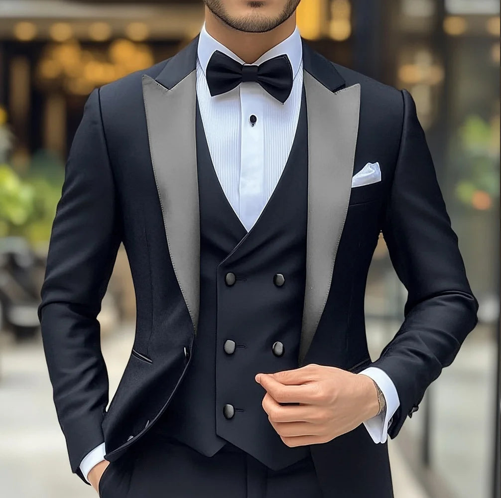 Black groom wedding tuxedo suit by Showlu Fashion, featuring a slim fit 3-piece jacket, pants, and vest with peak lapel.