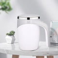 SHOWLU Automatic Stirring Coffee Mug with stainless steel body and rechargeable design, featuring a sleek, modern look.