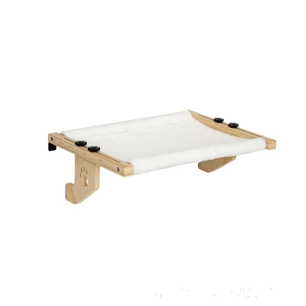 Showlu Wooden Frame Cat Window Hammock with paw print design, providing a durable and comfortable bed for cats to lounge near the window.