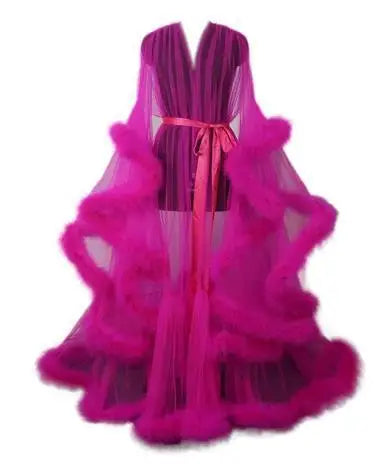 Deep V-neck lace maternity dress with tulle, long sleeves, feather details, and hollow horn design, perfect for photoshoots.