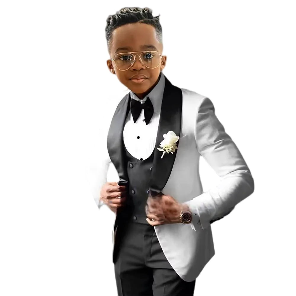 Boy's wedding tuxedo suit with white jacket, royal blue pants, and matching vest, tailored slim fit blazer set by Showlu Fashion Store.