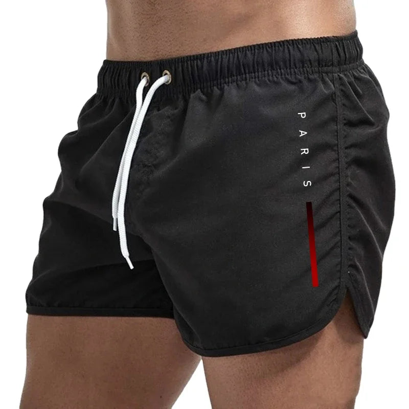 Men's casual board shorts by Showlu, suitable for beach, surfing, and gym workouts, in a vibrant summer design.