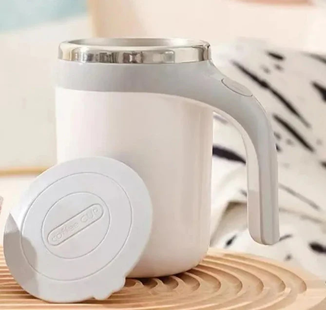 Showlu automatic self-stirring stainless steel coffee mug with magnetic stirring mechanism and ergonomic handle.