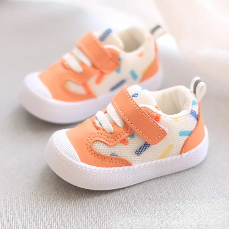 Unisex baby sneakers from SHOWLU FASHION STORE with breathable mesh upper and soft sole, ideal for comfortable toddler footwear.