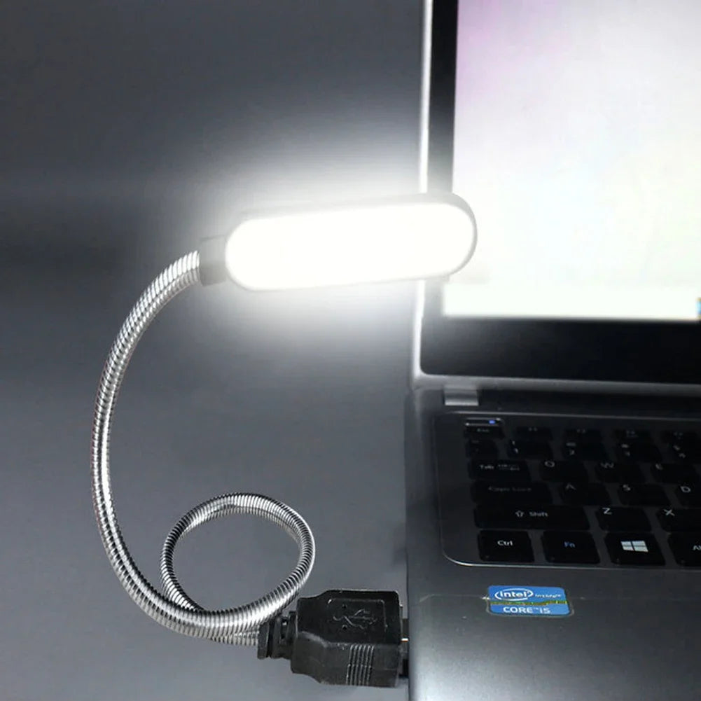 Showlu Smart General USB LED Light connected to a laptop, providing focused illumination for work or gaming.