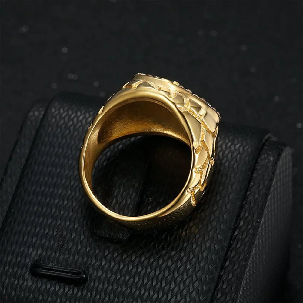 Men's iced out Jesus cross ring in 18k gold plated stainless steel, featuring detailed religious cross design and sparkling embellishments.