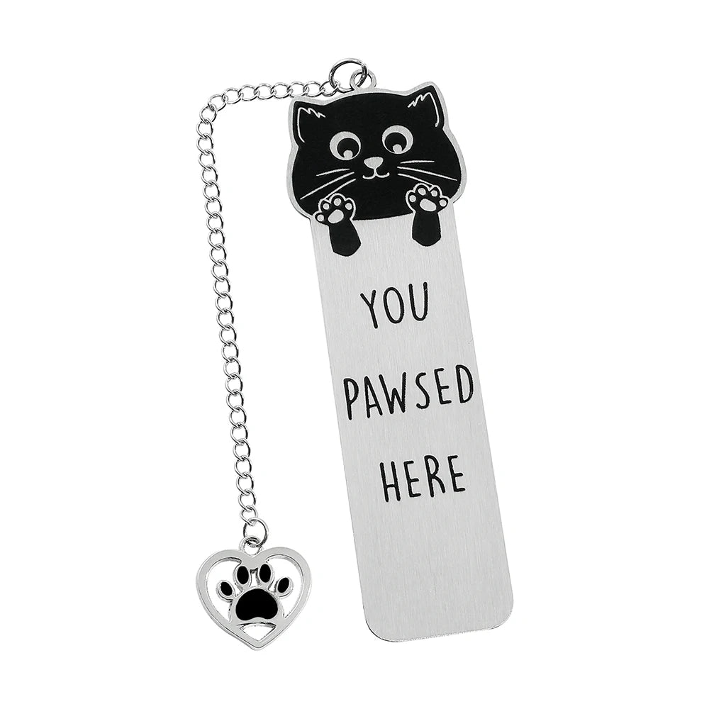 Colorful stainless steel waving cat bookmark with a geometric design, perfect for marking pages in books.