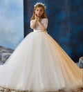 Ivory flower girl dress by Showlu Fashion with beaded bow, long sleeves, ideal for weddings and first communions.