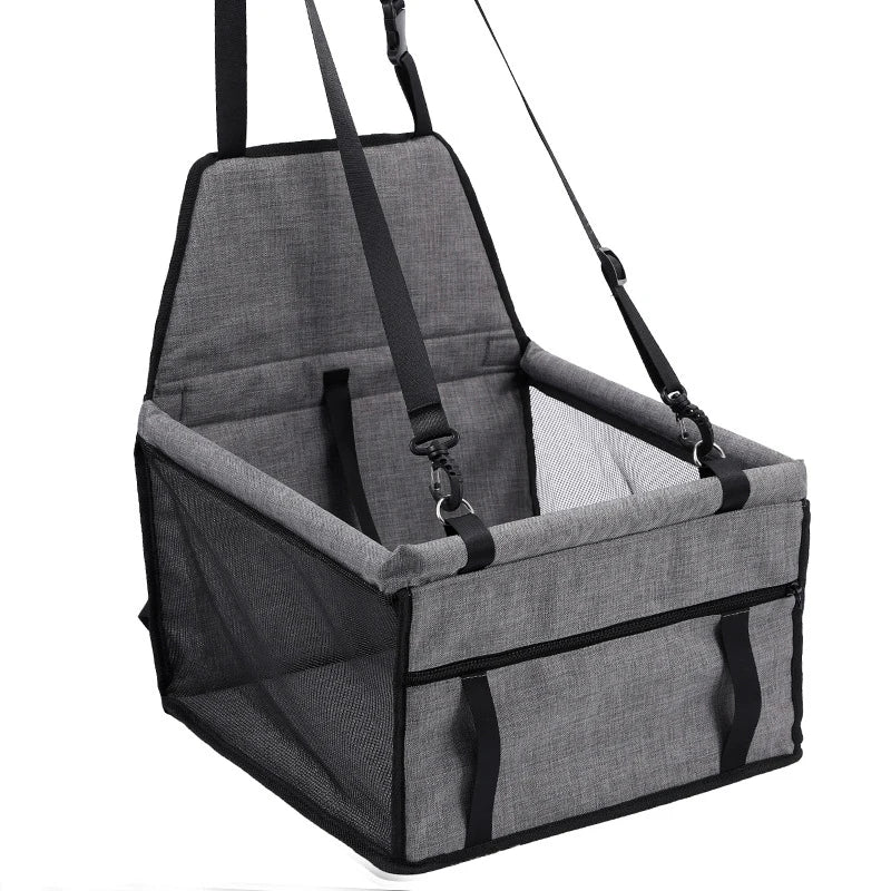 Showlu Fashion breathable nylon dog car seat cover with folding pet hammock, designed to keep pets safe and comfortable during car rides.