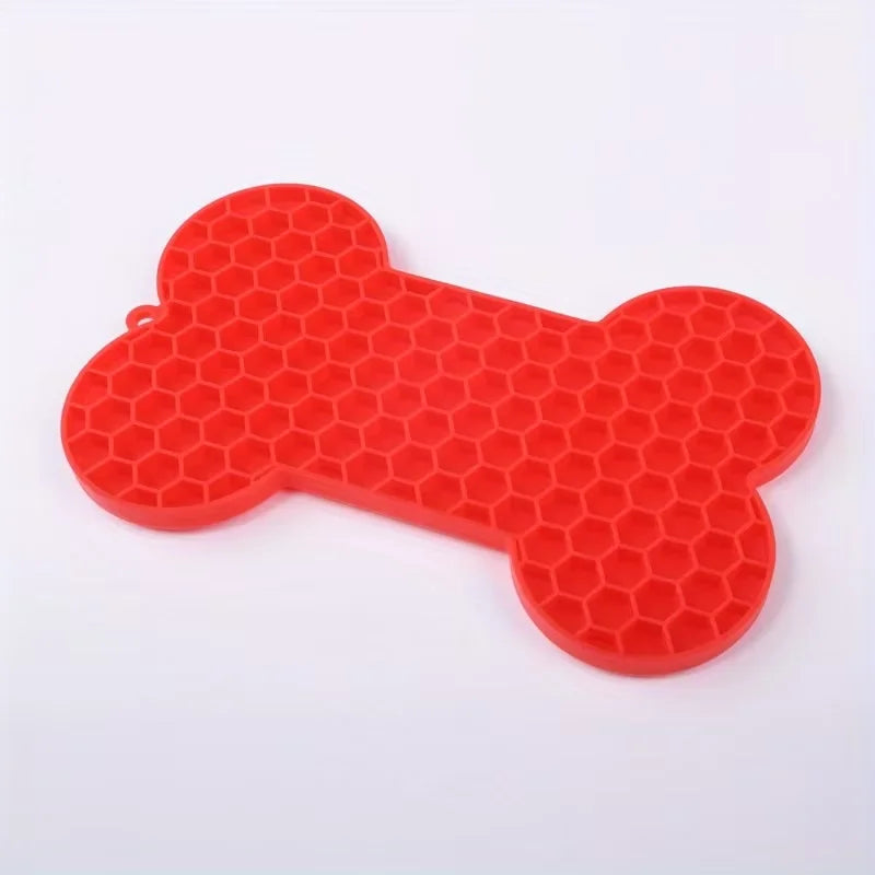 Silicone dog slow food pad and licking mat with bone design, ideal for pet feeding and enrichment for dogs and cats.