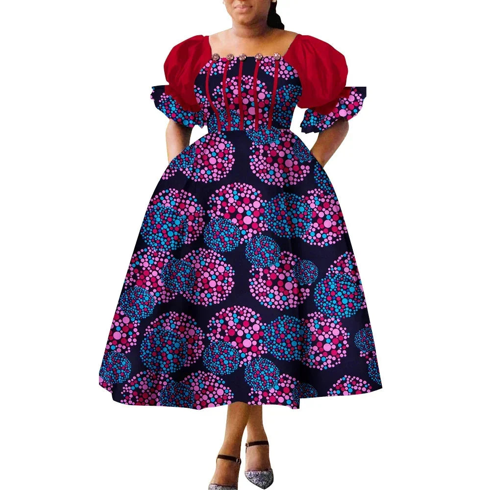 African print puff sleeve high waist Ankara cotton gown by SHOWLU FASHION STORE, featuring vibrant patterns and elegant design.