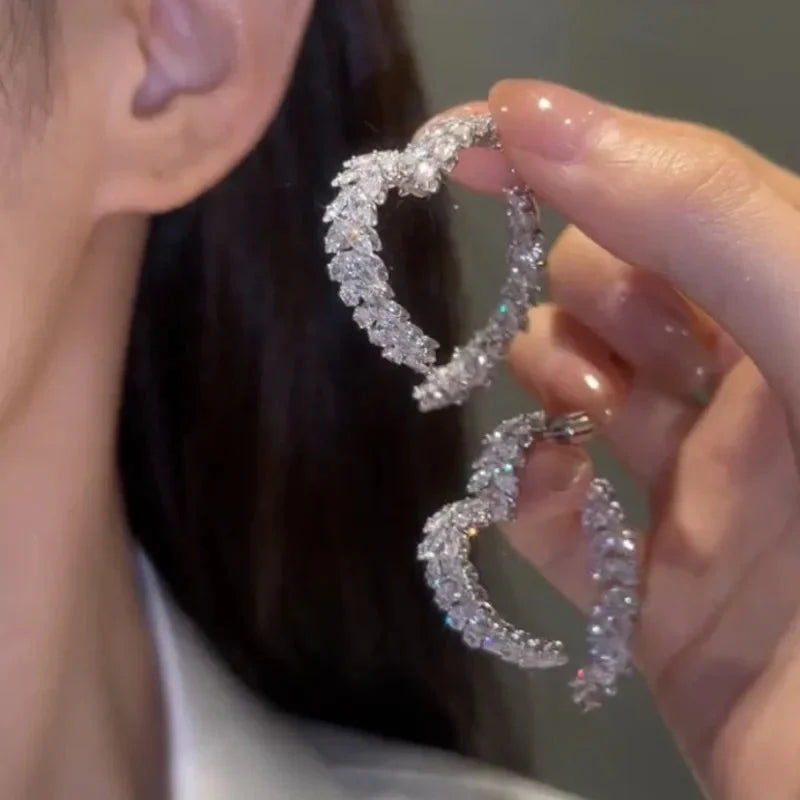 SHOWLU FASHION Zircon Leaf Stud Earrings featuring Korean style copper jewelry with sparkling zircon accents.