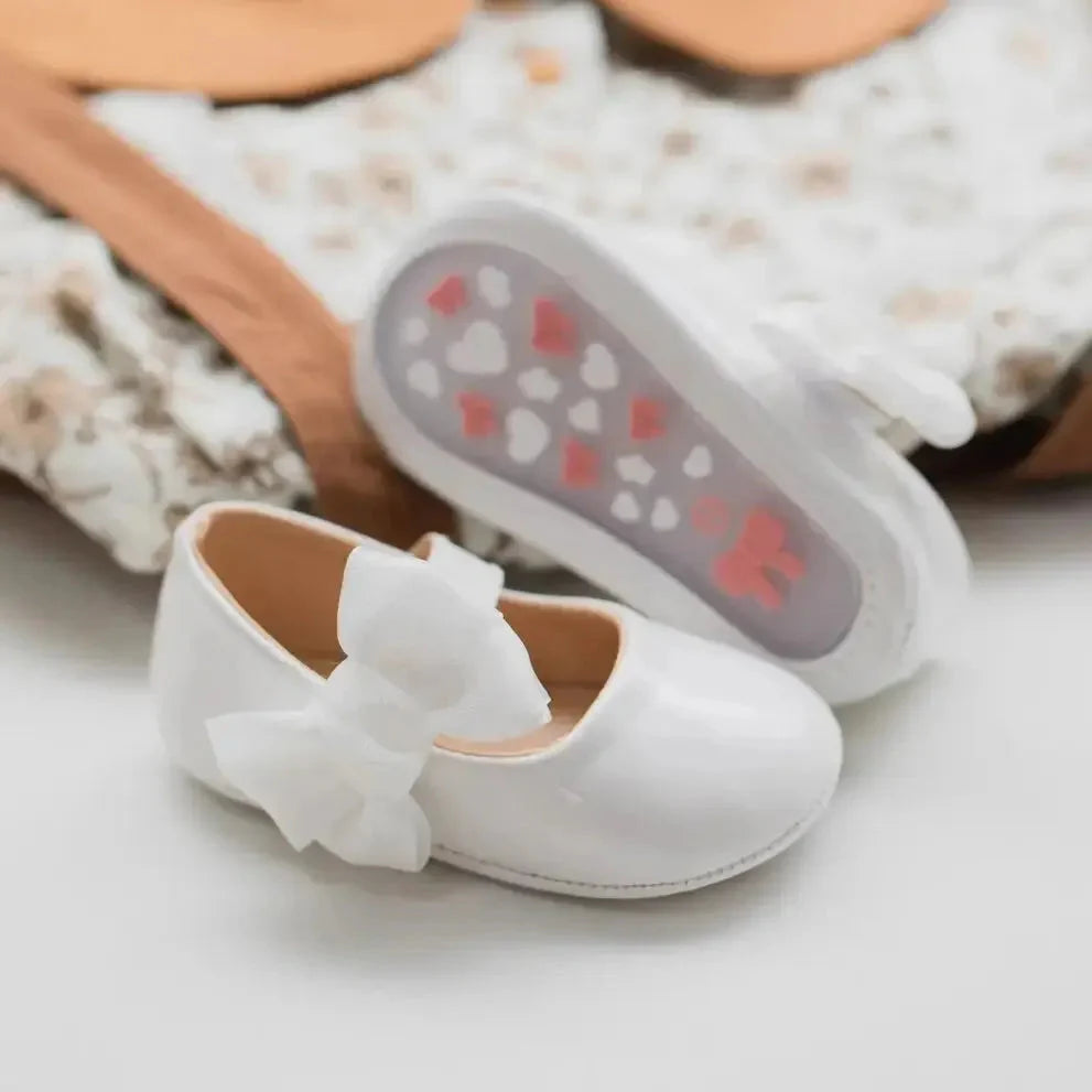 Baby girls' PU leather bowknot shoes from Meckior by SHOWLU FASHION STORE, featuring non-slip soles for first walkers.