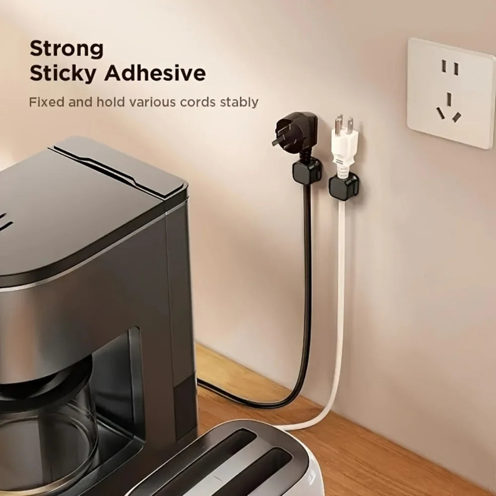 Showlu Smart General magnetic cable clips organizer holding charging and data cables on a desk surface.