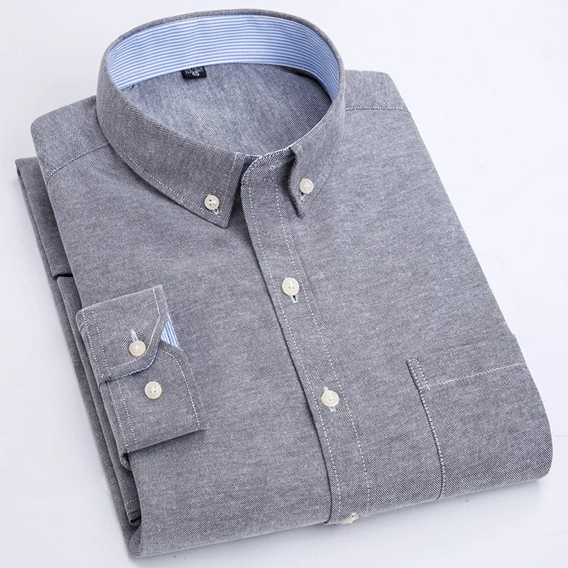 Men's slim fit Oxford shirt by Showlu Fashion Store, long sleeve casual top with non-iron fabric, in classic blue color.