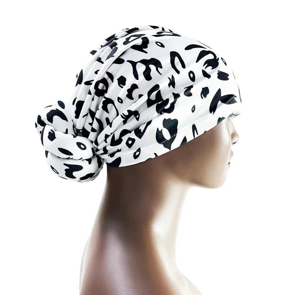 SHOWLU Knotted Head Wrap with luxury floral polyester design, stylish party headdress featuring elegant floral patterns.