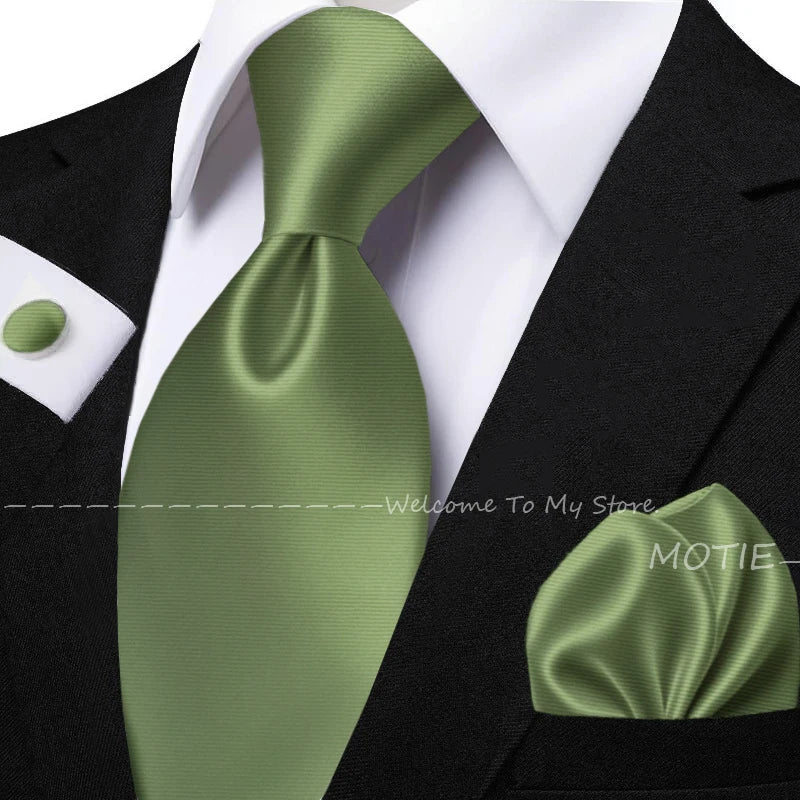 Men's solid sage green tie set with pocket square, flower brooch, cufflinks, and collar accessories for daily wear or weddings.