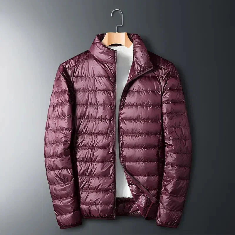 Men's ultra light white duck down jacket by SHOWLU, waterproof padded coat with quilted design and stand collar, suitable for cold weather.