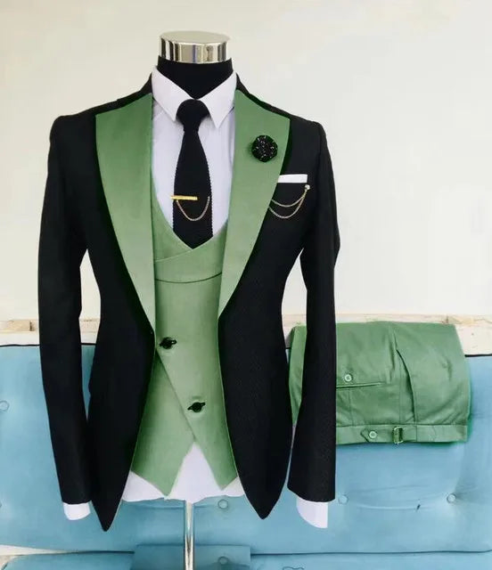 Slim fit black men's business suit by Showlu Smart General, including tuxedo jacket, pants, and vest for formal occasions.