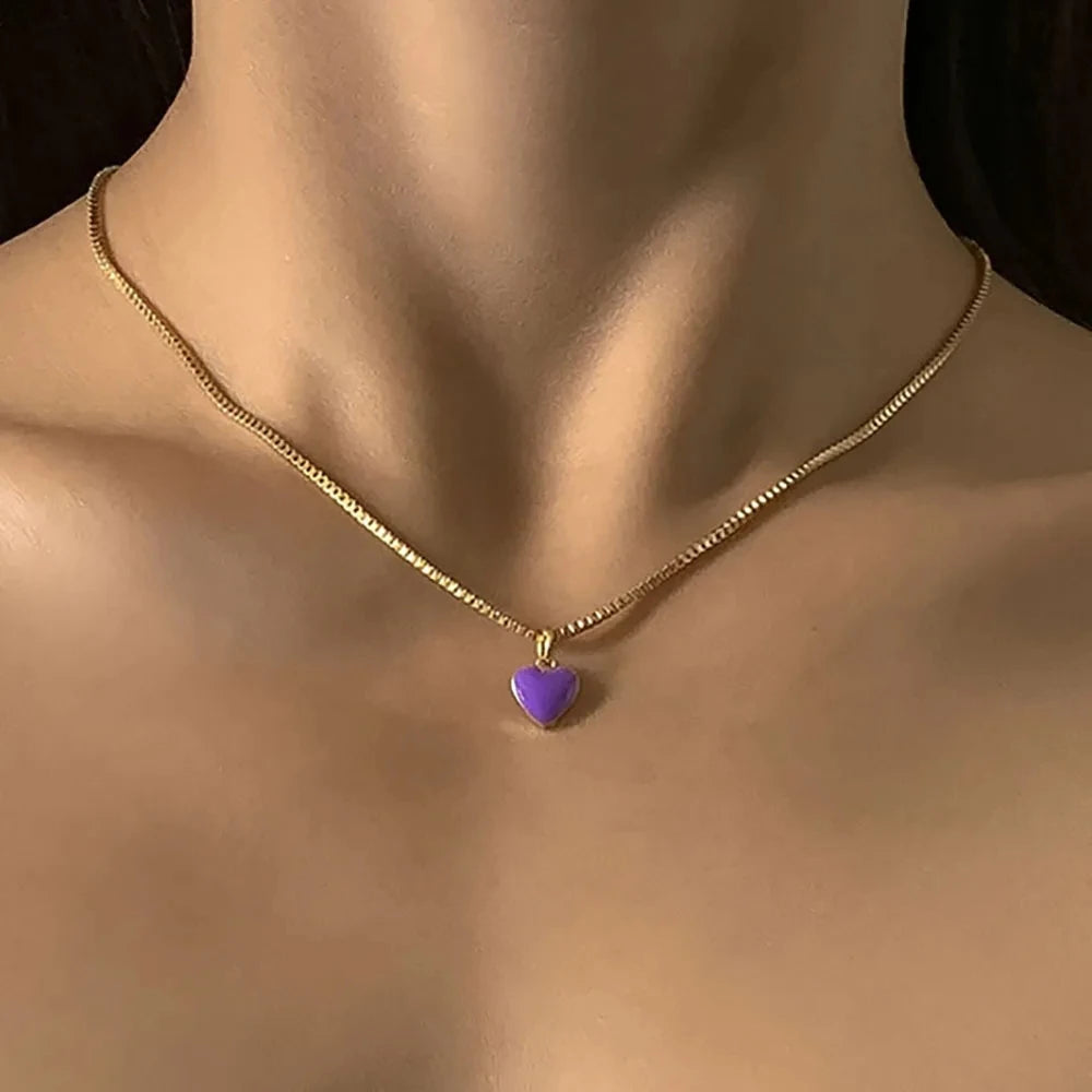 Gold-colored boho clavicle necklace with cherry pendant, romantic jewelry for women, stylish fashion accessory for 2022.