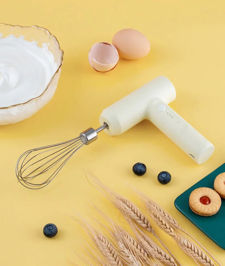 Showlu Smart General electric egg beater with stainless steel beaters, compact design, and easy-to-hold handle.