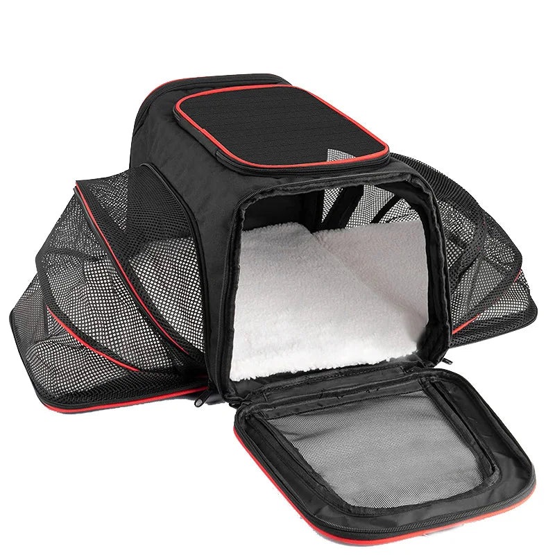 Foldable Showlu Fashion pet carrier bag for cats, portable travel bag with mesh panels and soft handles for easy transport.