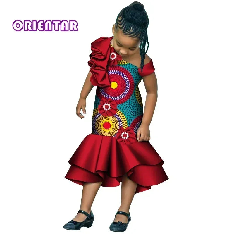 Girls African print dashiki mermaid dress by Showlu Fashion Store, cotton party gown with vibrant colorful patterns and fitted silhouette.