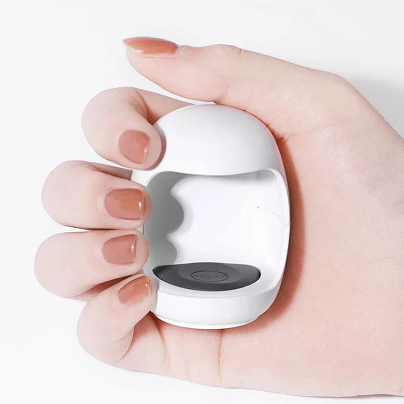 Showlu Smart General LED Nail Dryer Mini with black exterior, compact design, and digital timer display for quick, efficient nail curing.