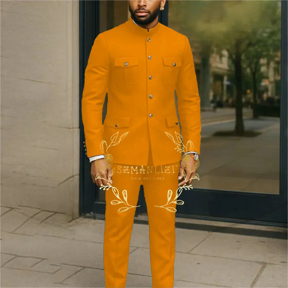 White Affrica style men's suit with stand collar, single-breasted blazer and matching pants, ideal for business or wedding attire.