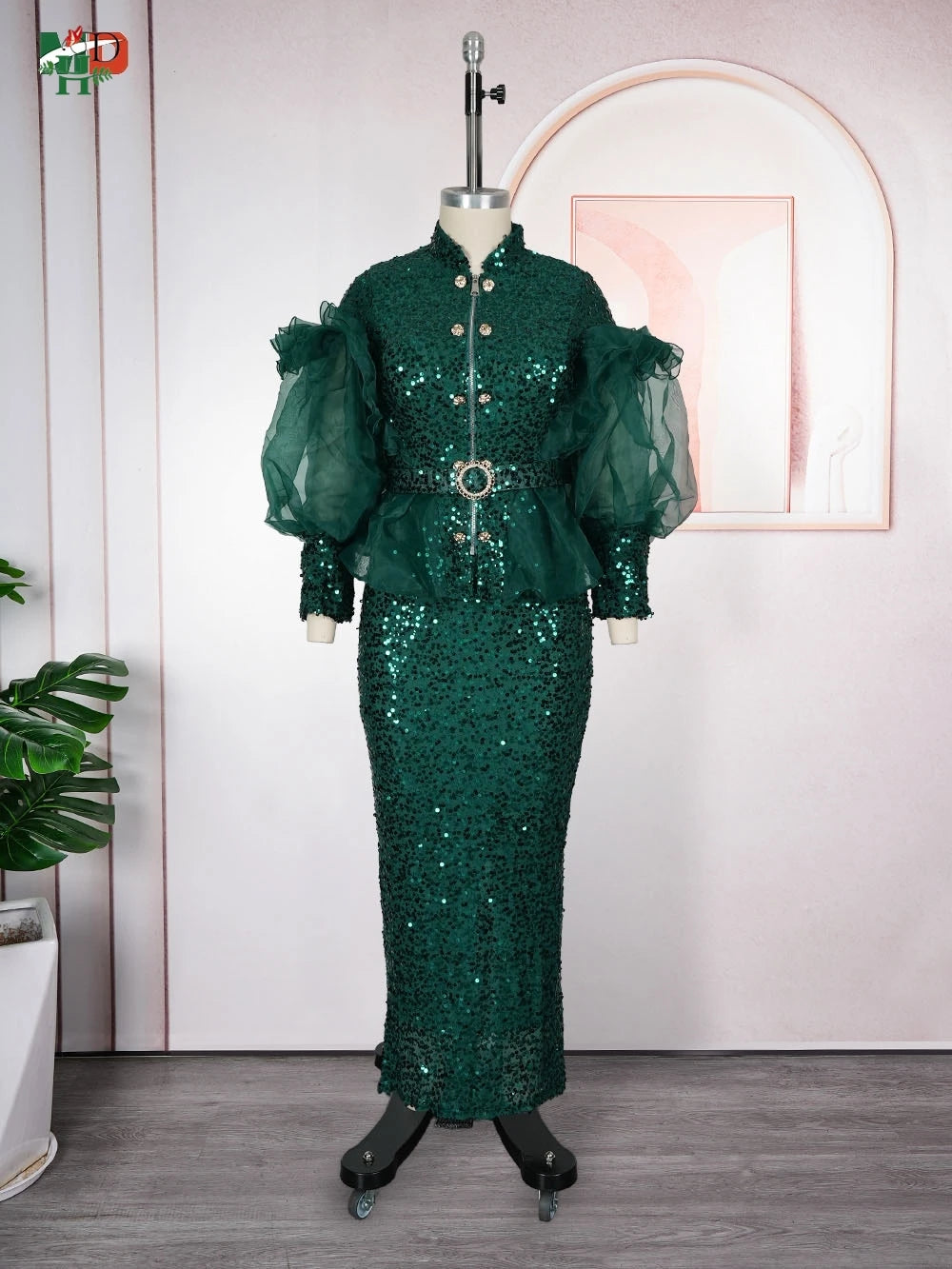 African Sequin 2-piece dress set by H&D, featuring a puffy mesh sleeve top and a matching maxi skirt, in vibrant sequin details.