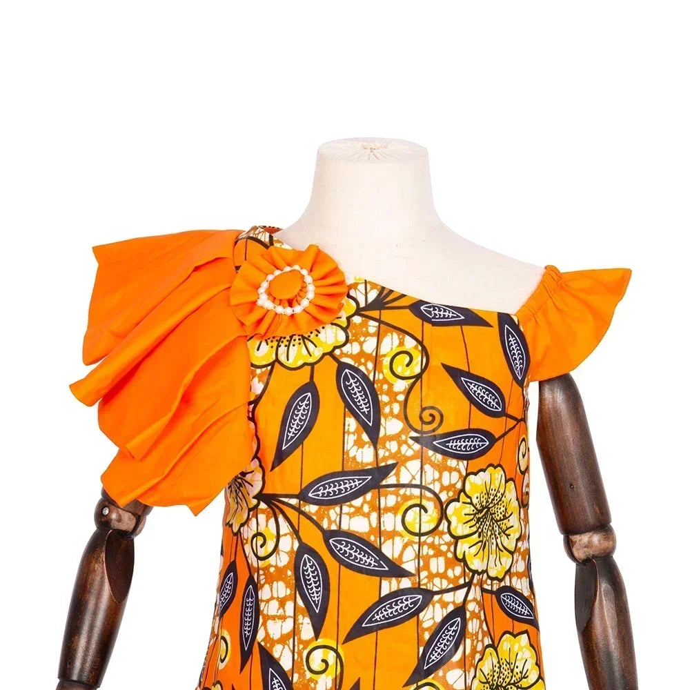 Girl wearing a colorful African print cotton dashiki mermaid dress, stylish party gown designed by SHOWLU FASHION STORE.
