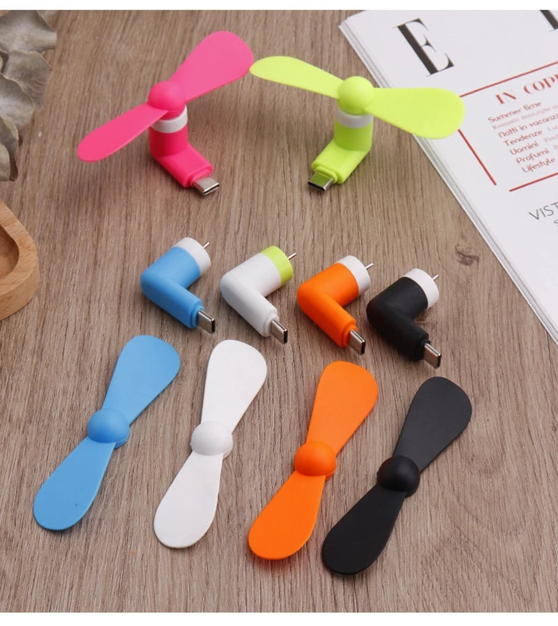 Showlu Smart General USB mini fan with adjustable blades and compact design for portable cooling.