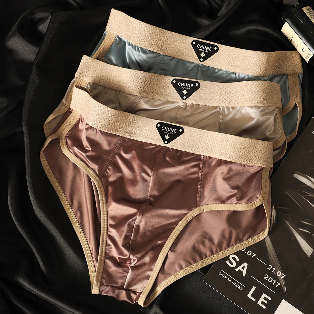 Luxury satin-like men's briefs in ice silk with breathable mesh crotch, soft high elasticity, and moisture-wicking fabric.