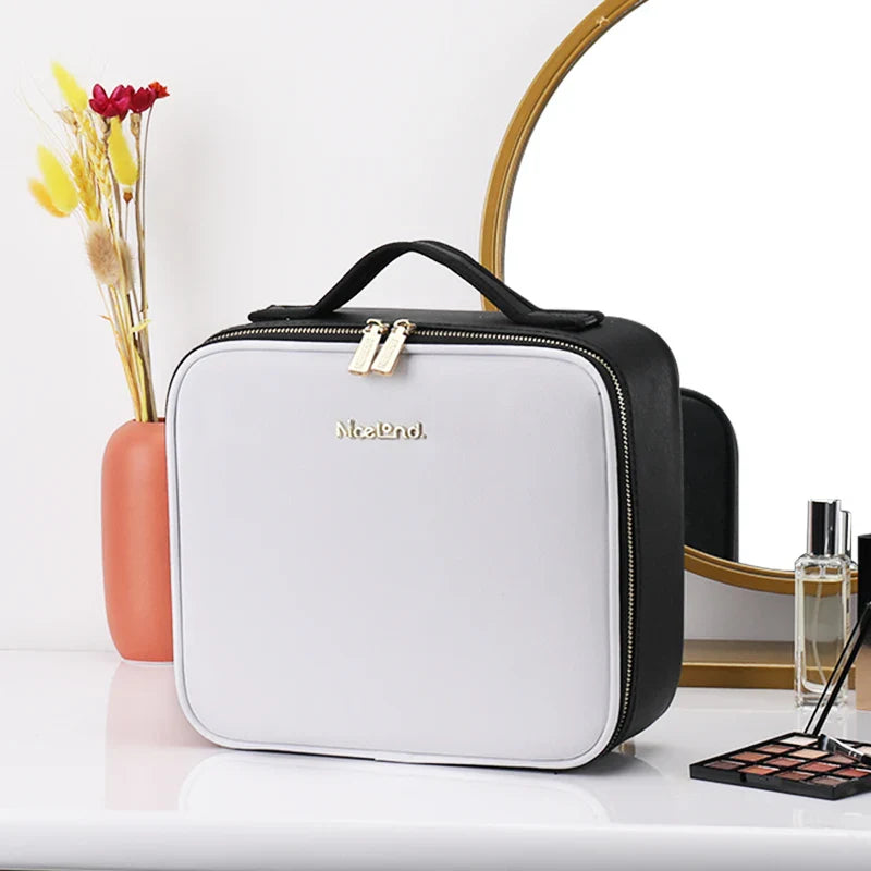 SHOWLU travel makeup bag with LED lighted mirror and PU leather finish, stylish toiletry case for cosmetics and accessories.