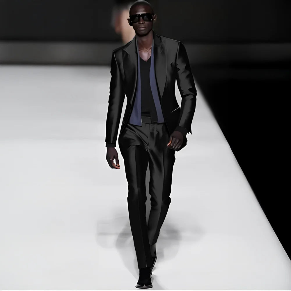 Fashionable satin men's 2-piece suit with peak lapel blazer and matching pants, suitable for weddings and formal occasions.